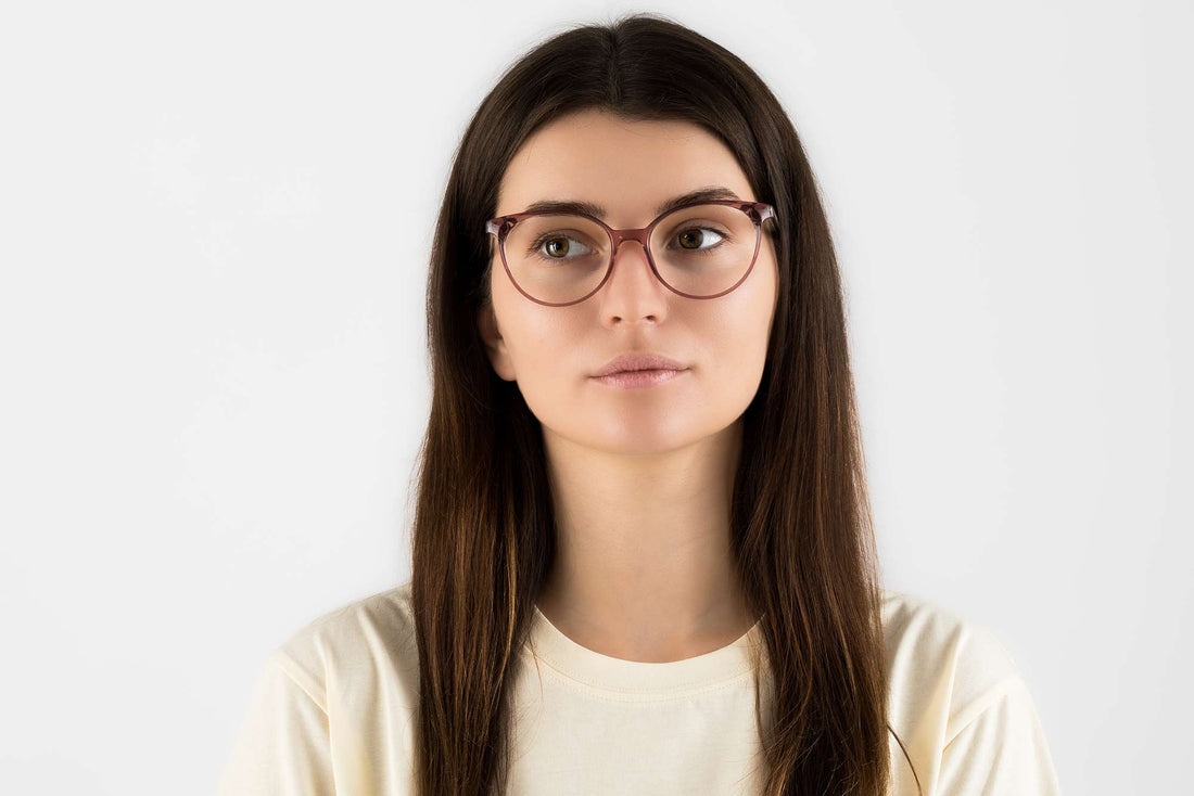 Woman wearing Felicity Pink, Oval Pink Acetate Glasses