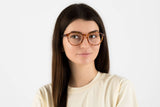 Woman wearing Hope Orange, Orange Tortoise Oval Glasses