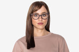 Woman wearing Charm Purple, Cat Eye Sandal Wood Glasses