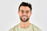 Man wearing Bold Blonde, Rectangle Yellow Zebra Wood Glasses