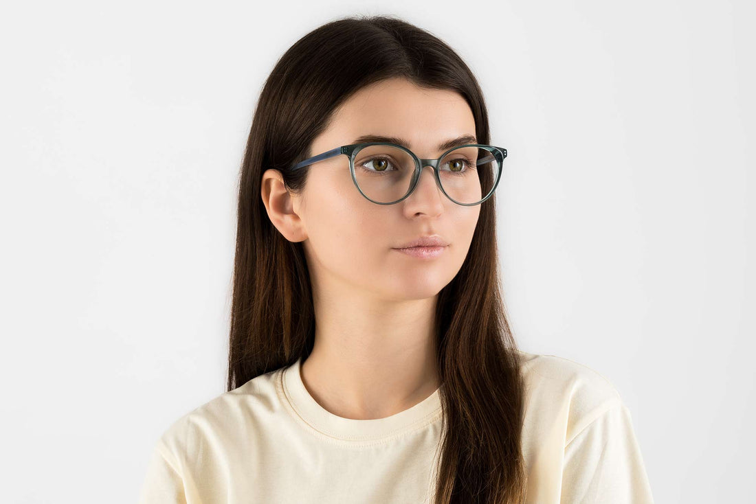 Woman wearing Felicity Blue, Oval Blue Turquoise Acetate Glasses