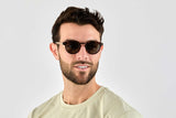 Man wearing Trevor, Small Round Tortoise Sunglasses