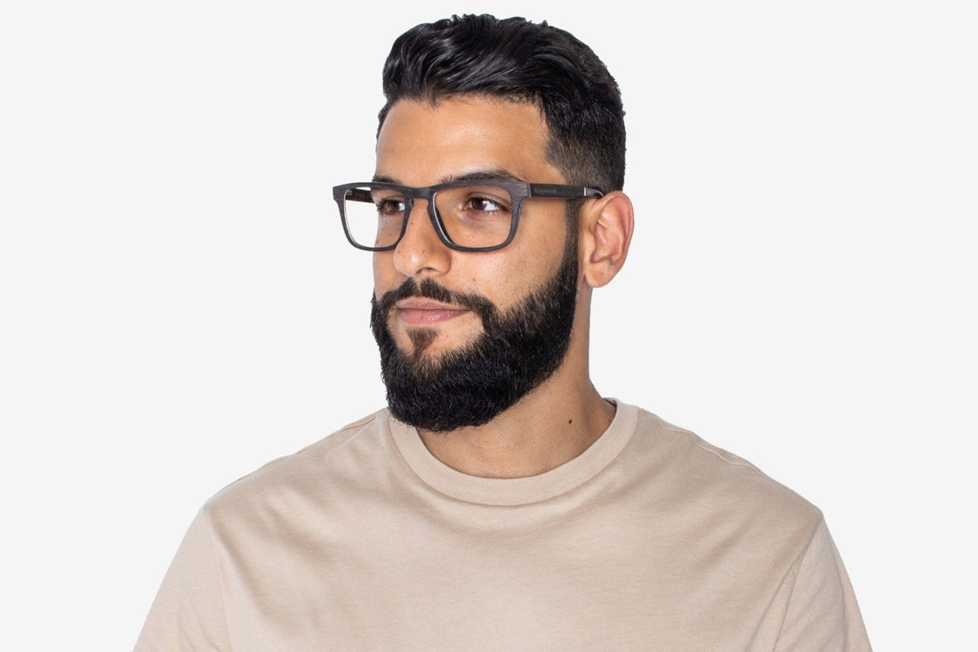 Man wearing Bold Black, Rectangle Black Oak Wood Glasses