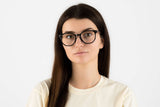 Woman wearing Faith Black, Black Acetate Geometric Glasses