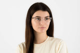 Woman wearing Grace Clear, Square Clear Acetate Glasses