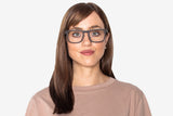 Woman wearing Bold Black, Rectangle Black Oak Wood Glasses