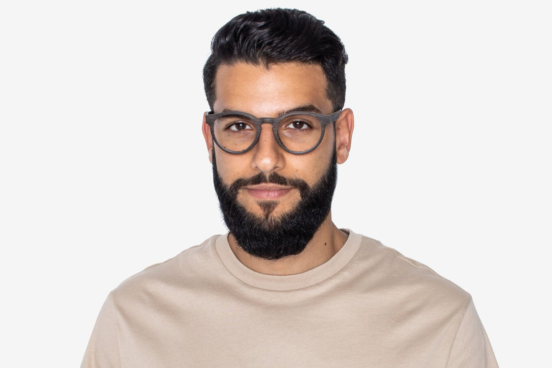 Man wearing Cheer Black, Retro Round Oak Wood Glasses