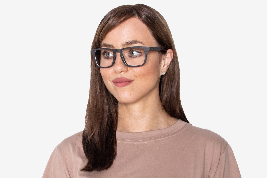 Woman wearing Bold Black, Rectangle Black Oak Wood Glasses