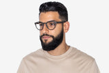 Man wearing Cheer Black, Retro Round Oak Wood Glasses