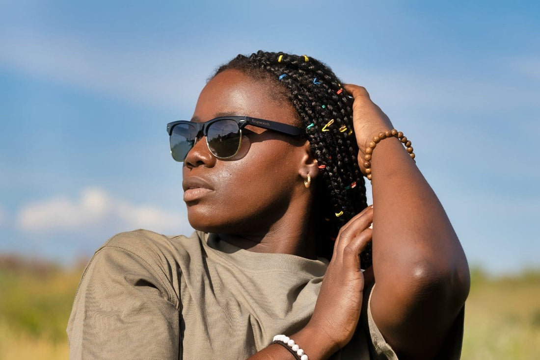 Woman wearing Black Jaguar, Black Browline Sunglasses