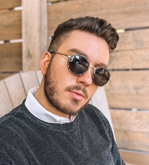 Man wearing Kraywoods Aspen sunglasses, round wood sunglasses