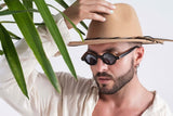 Man wearing Magnolia, Small Round Wood Sunglasses