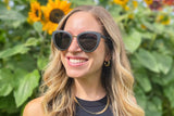 Woman wearing Willow, Black Oversized Cat Eye Sunglasses